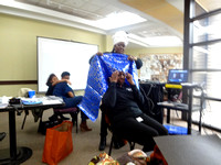 Jatu demonstrating one of the many ways to wrap a Gele